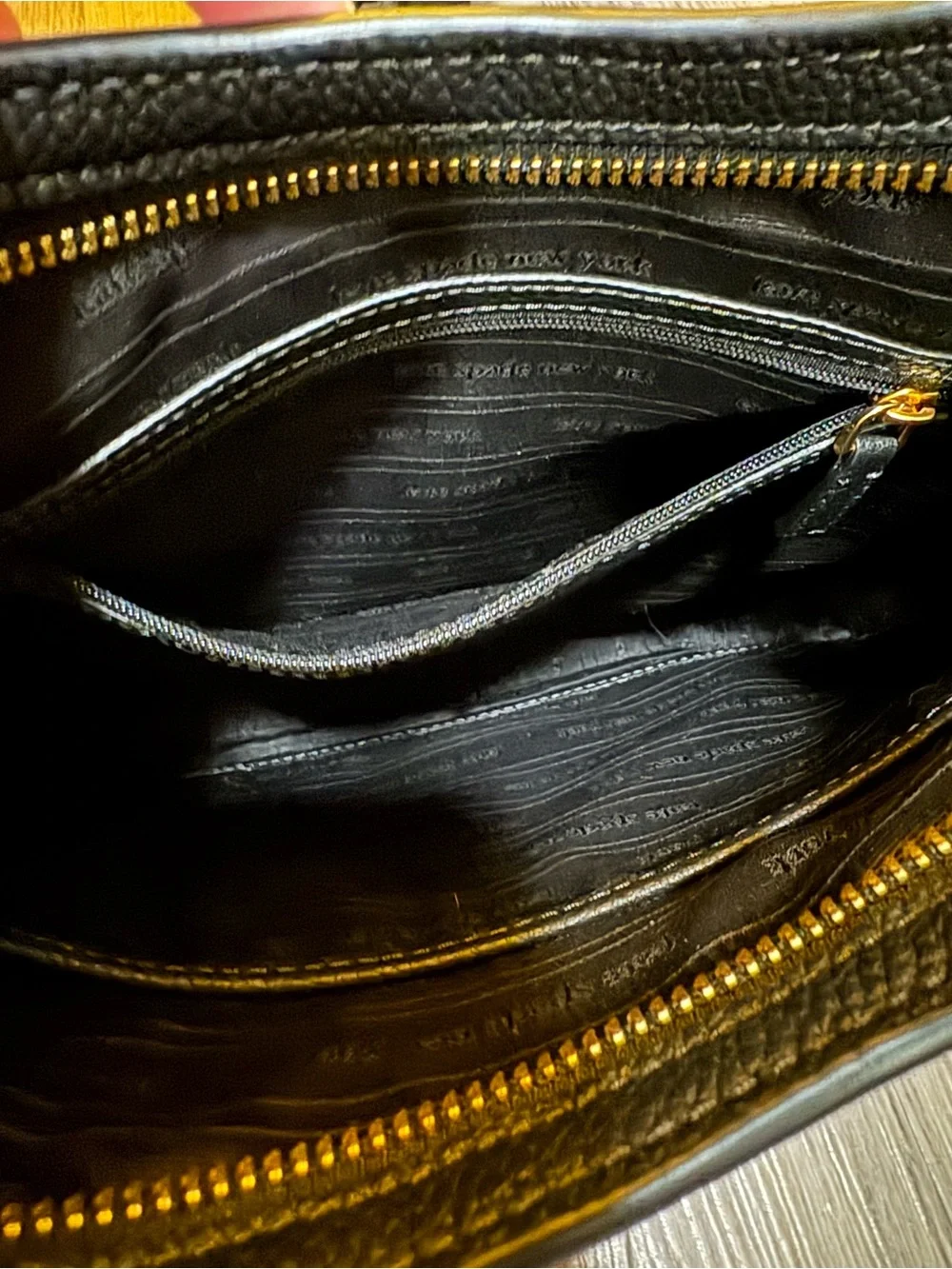 kate spade Black Pebbled Leather Curved Crossbody with Gold Hardware